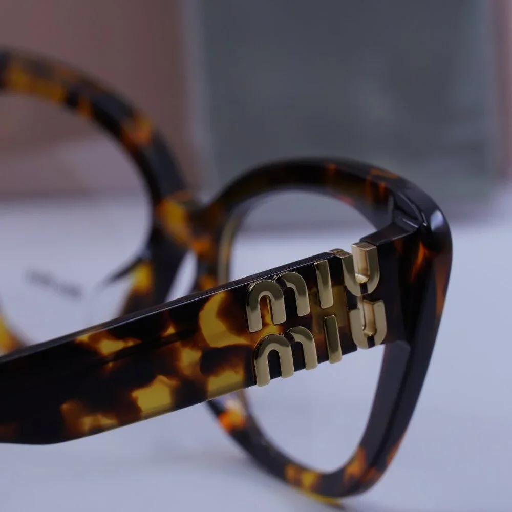 Miu Miu MU05VV VAU1O1 Cat Eye Eyeglasses 53mm – Honey Havana